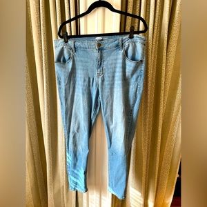 Medium wash mid rise super skinny jeans size 16